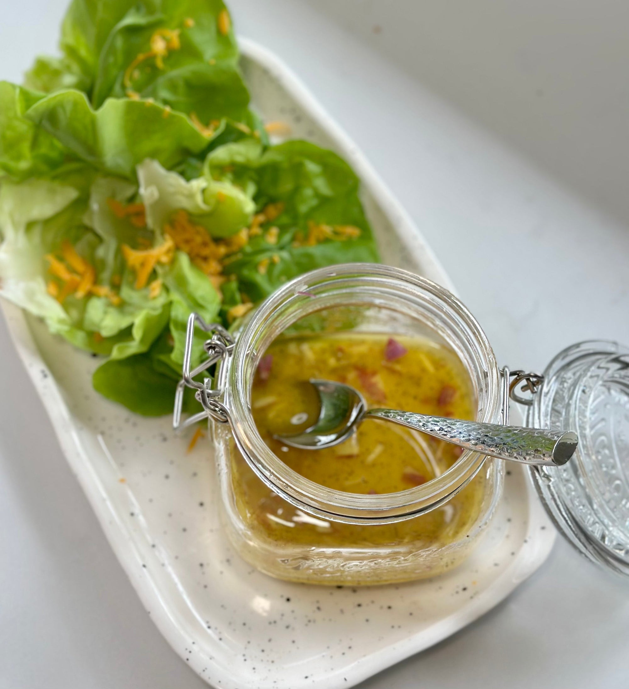 This rich and flavorful make-ahead salad dressing combines olive oil, black truffle oil, Dijon mustard, and Kanuka honey for the perfect balance of tangy and sweet-ideal for dressing salads all week long.