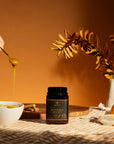 BeeNZ Raw UMF Certified Mānuka Honey UMF 10+ (MGO 261+) 8.8oz – Medium-level NZ honey with earthy mineral flavor, supports well-being & immunity, perfect for warm drinks.