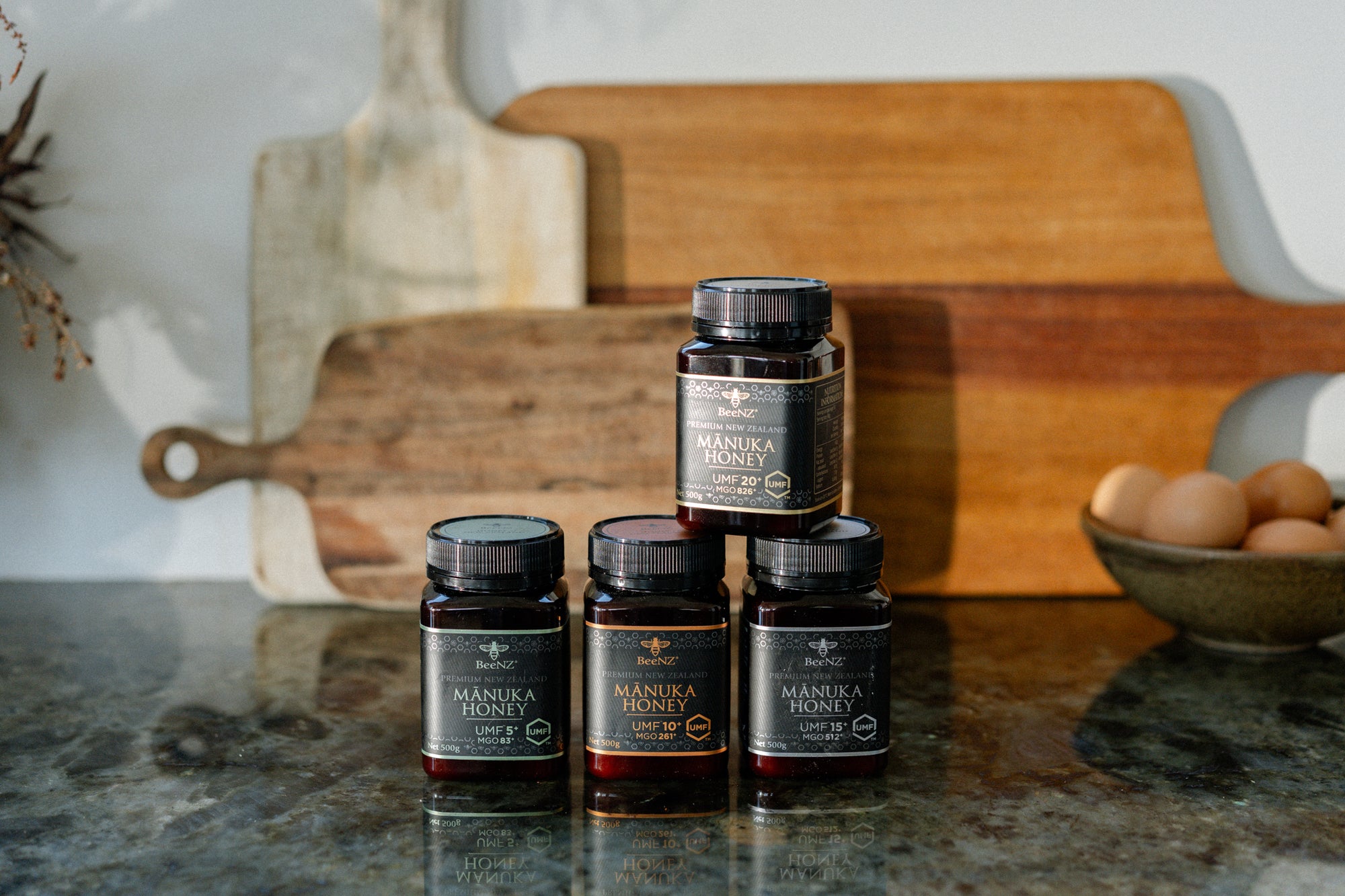 Jars of Manuka Honey on a kitchen counter 